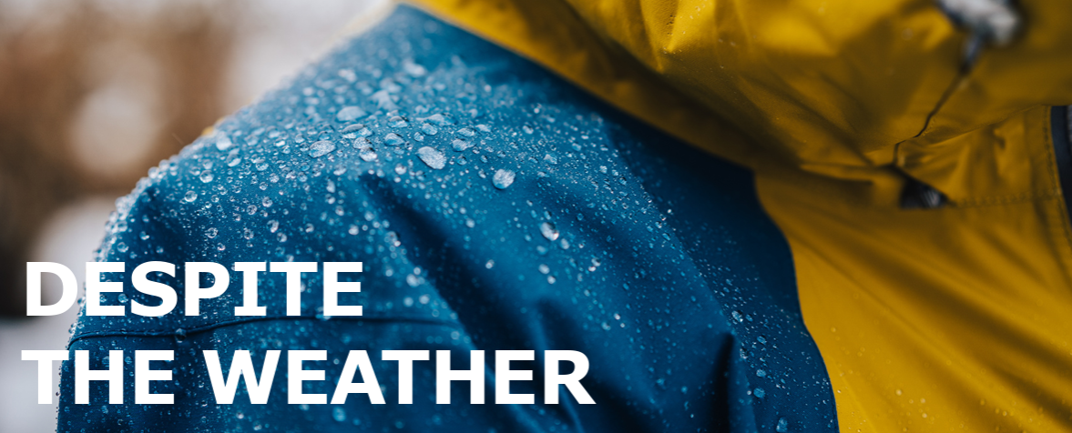 Water-Repellent Technical Jacket – Despite the Weather Close-up of water-repellent technical jacket with raindrops on the fabric surface